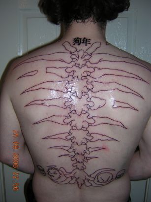 Back Bone Tattoo On Back